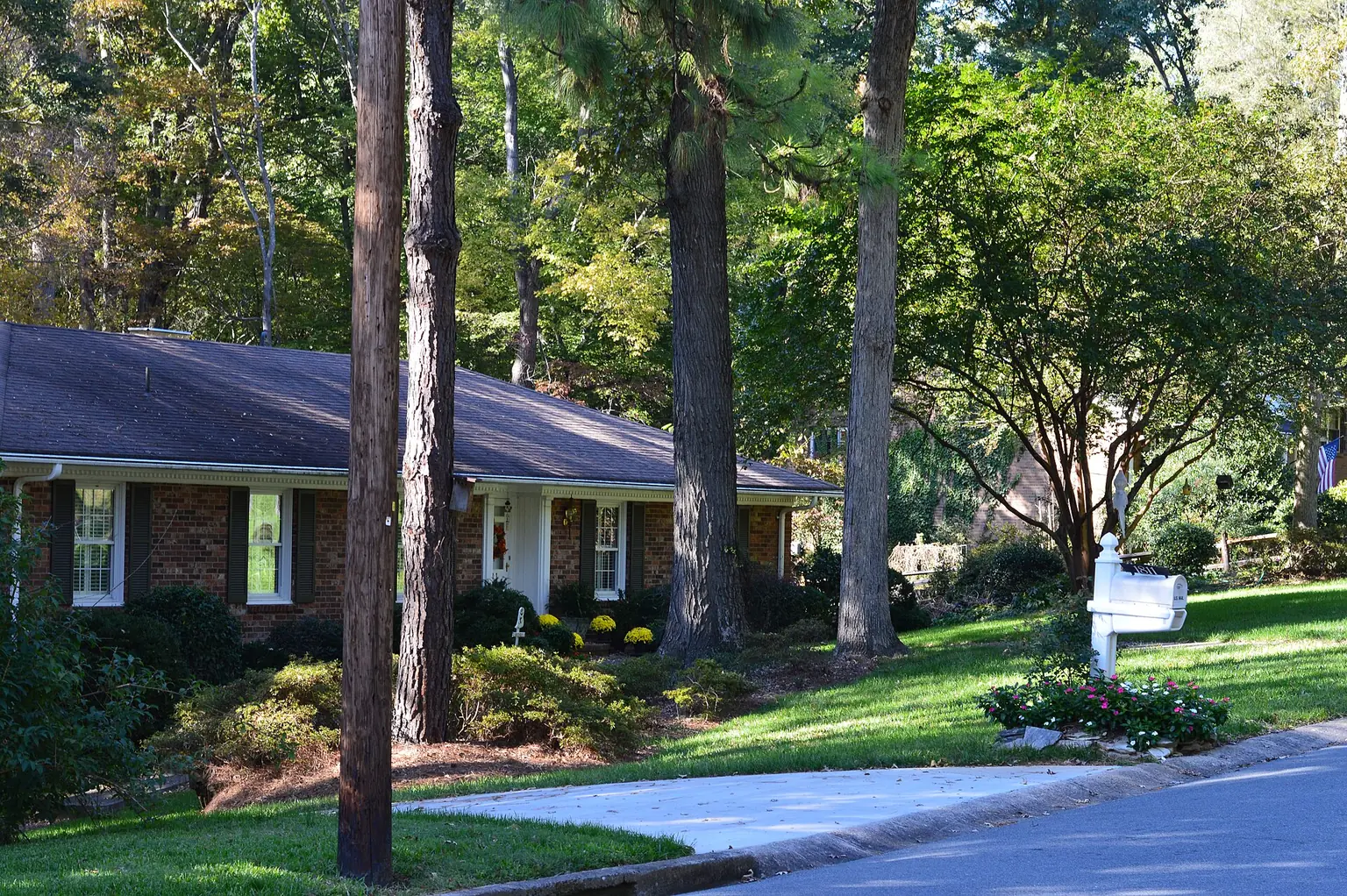 A 1950s brick ranch from Charlotte's postwar suburban expansion — Your most common garage conversion questions in Charlotte answered