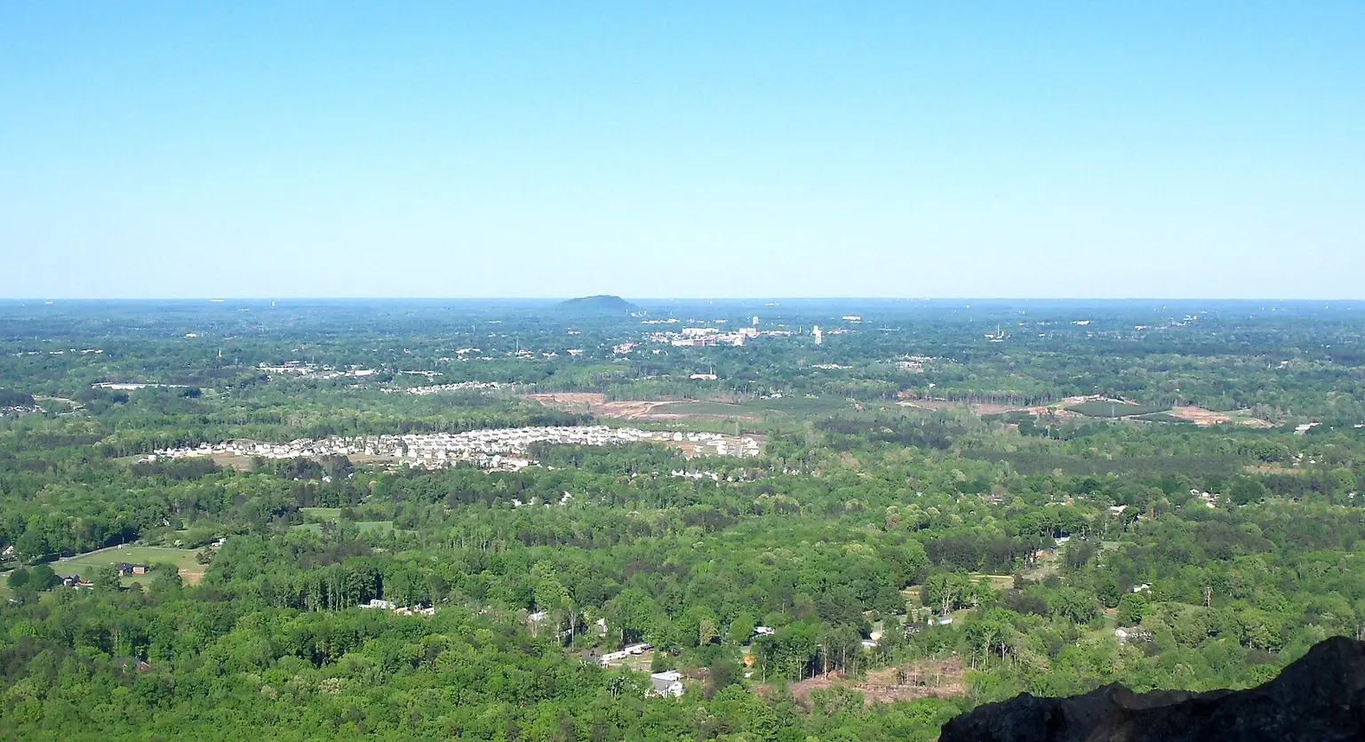 Rolling Piedmont country seen from Crowders Mountain State Park — How Can Driveway Slope Affect a Custom Home Concept in Lake Wylie?